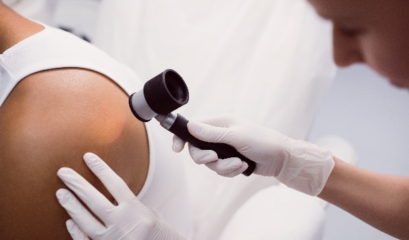 A Man Reducing His Risk Of Skin Cancer Through Examination